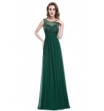 Зеленое шифоновое платье декорированное стразами 