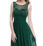 Зеленое шифоновое платье декорированное стразами 